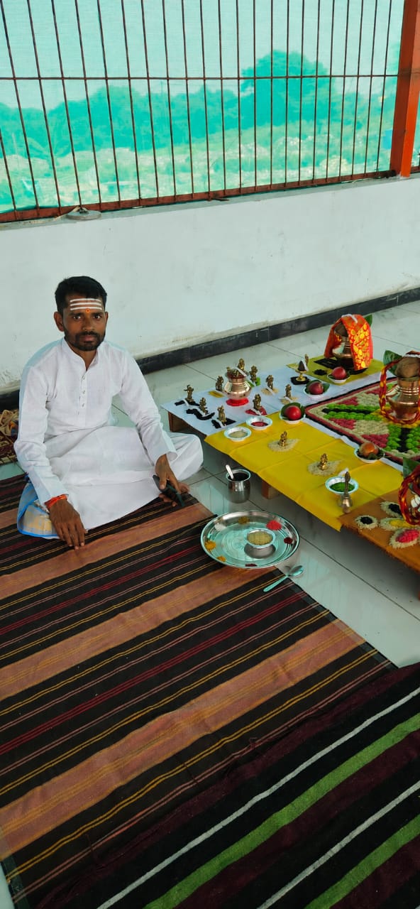 Priest performing puja